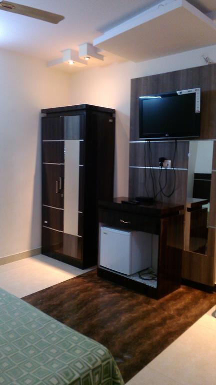 Hotel Kanishka Kanpur Habitación foto